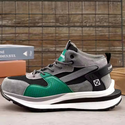 Sepatu Keselamatan Pigskin+Rajutan Terbang Mid-cut OEM Sepatu Kerja Keamanan Ujung Baja Kevlar Midsole Sepatu Kerja Sol EVA